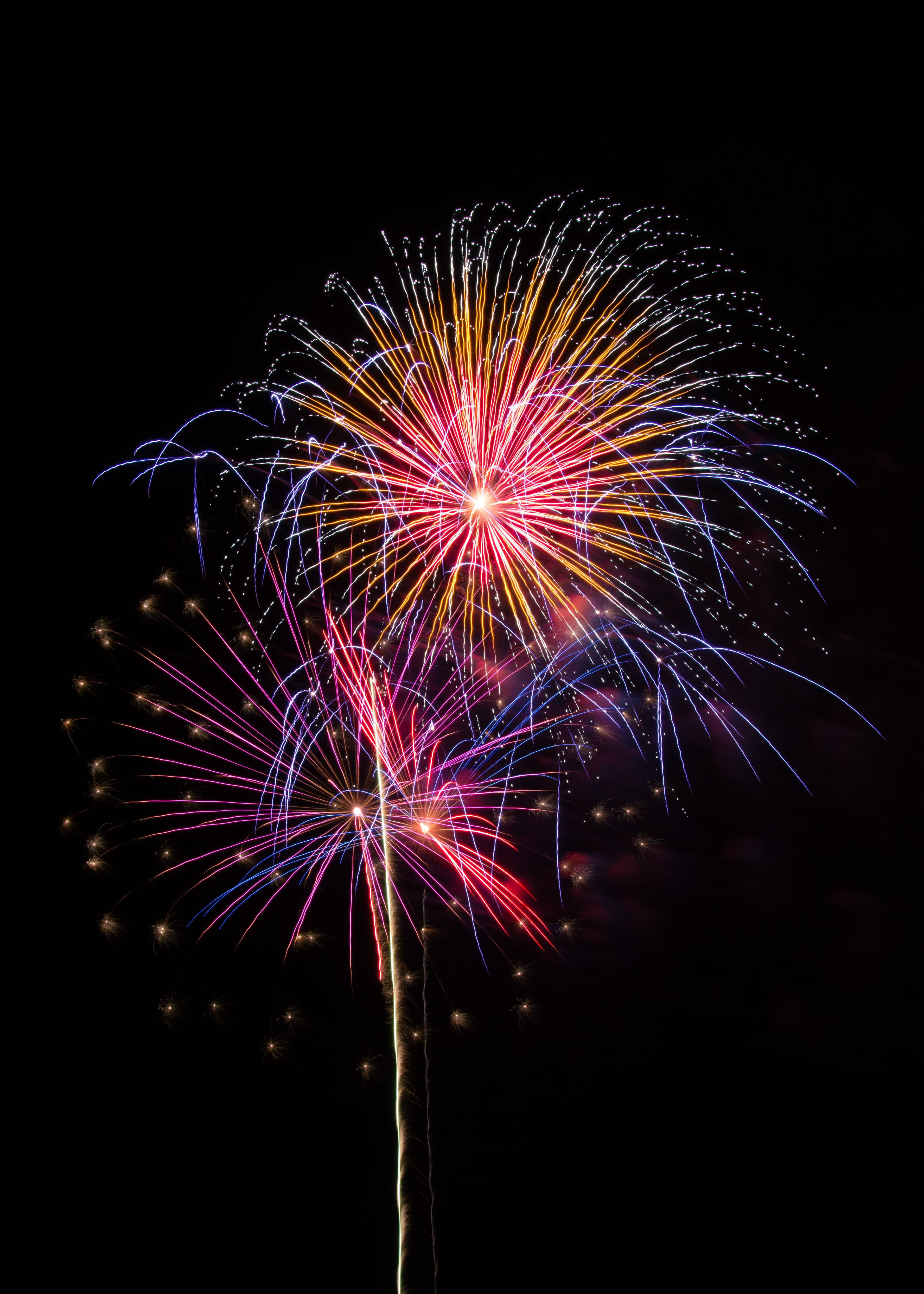 red and yellow fireworks display during nighttime